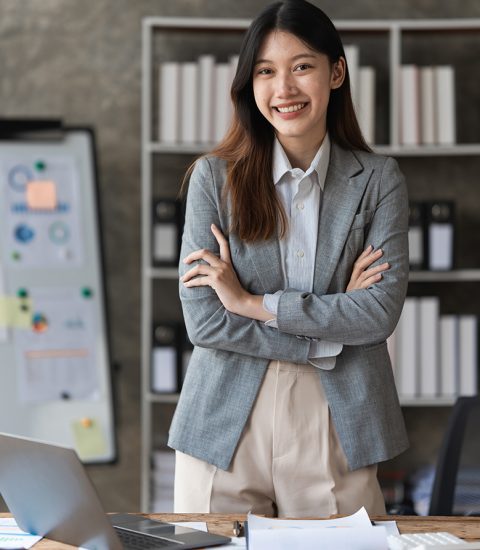 smart-asian-business-woman-smiling-at-office-space-2022-11-18-09-57-02-utc.jpg